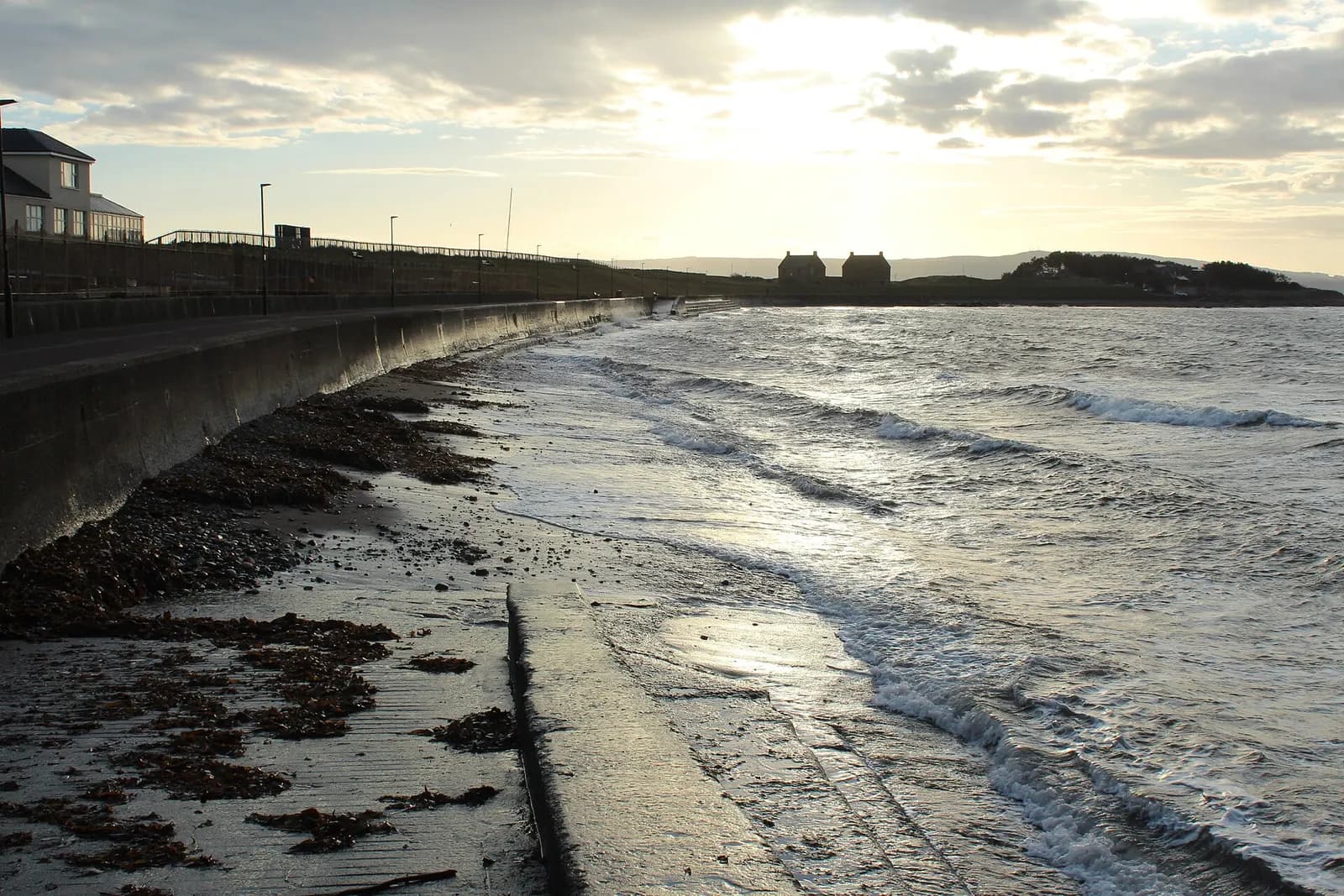 The seafront at Prestwick, with the tide against the sea wall